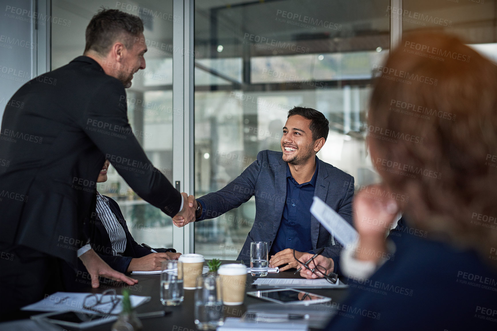 Buy stock photo Shot of businesspeople having a meeting in the office