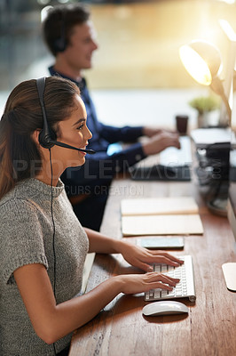 Buy stock photo Call center, smile and typing with woman at computer for customer service, help desk or consulting. Happy, advisory and ecommerce with employee in office for contact us, telemarketing or receptionist