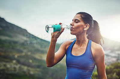 Buy stock photo Mountain, athlete or woman drinking water on break to hydrate or relax for healthy energy in exercise. Tired, fatigue and thirsty girl runner with liquid or fitness in marathon training or workout