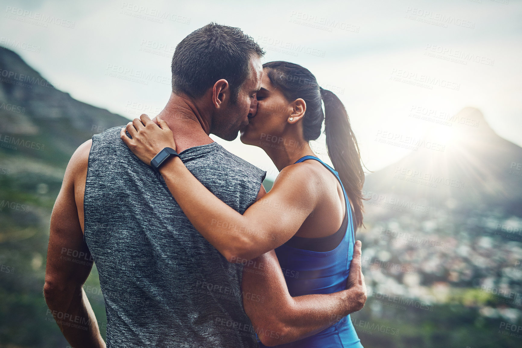 Buy stock photo Shot of a young attractive couple training for a marathon outdoors