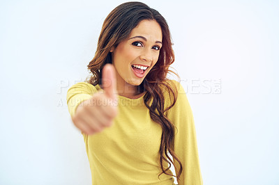Buy stock photo Studio portrait of a gorgeous young woman posing against a light background