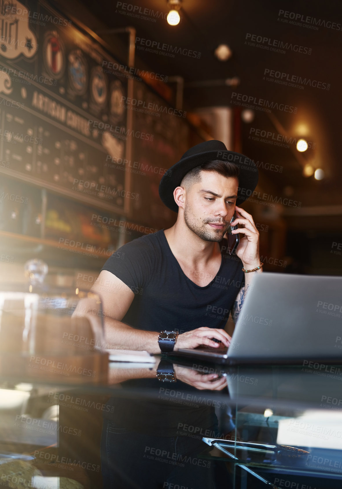 Buy stock photo Phone call, restaurant and man in cafe with laptop for small business, stock inventory and store website. Coffee shop, hospitality and owner by counter on computer for orders, online and discussion