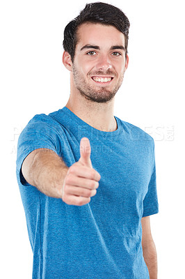 Buy stock photo Cropped portrait of a handsome young man giving thumbs up against a white background