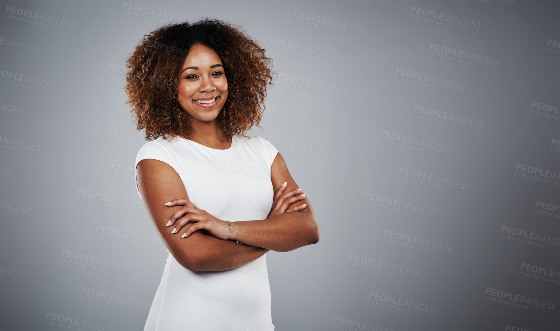 Buy stock photo Studio shot of a young businesswoman against a gray background