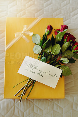 Buy stock photo Box, roses and letter on bed, gift and invitation in closeup, above or message for valentines day in hotel. Flowers, bouquet or plants with cardboard package, notes or clothes in bedroom in home