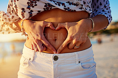 Buy stock photo Shot of an unecognizable woman on the beach