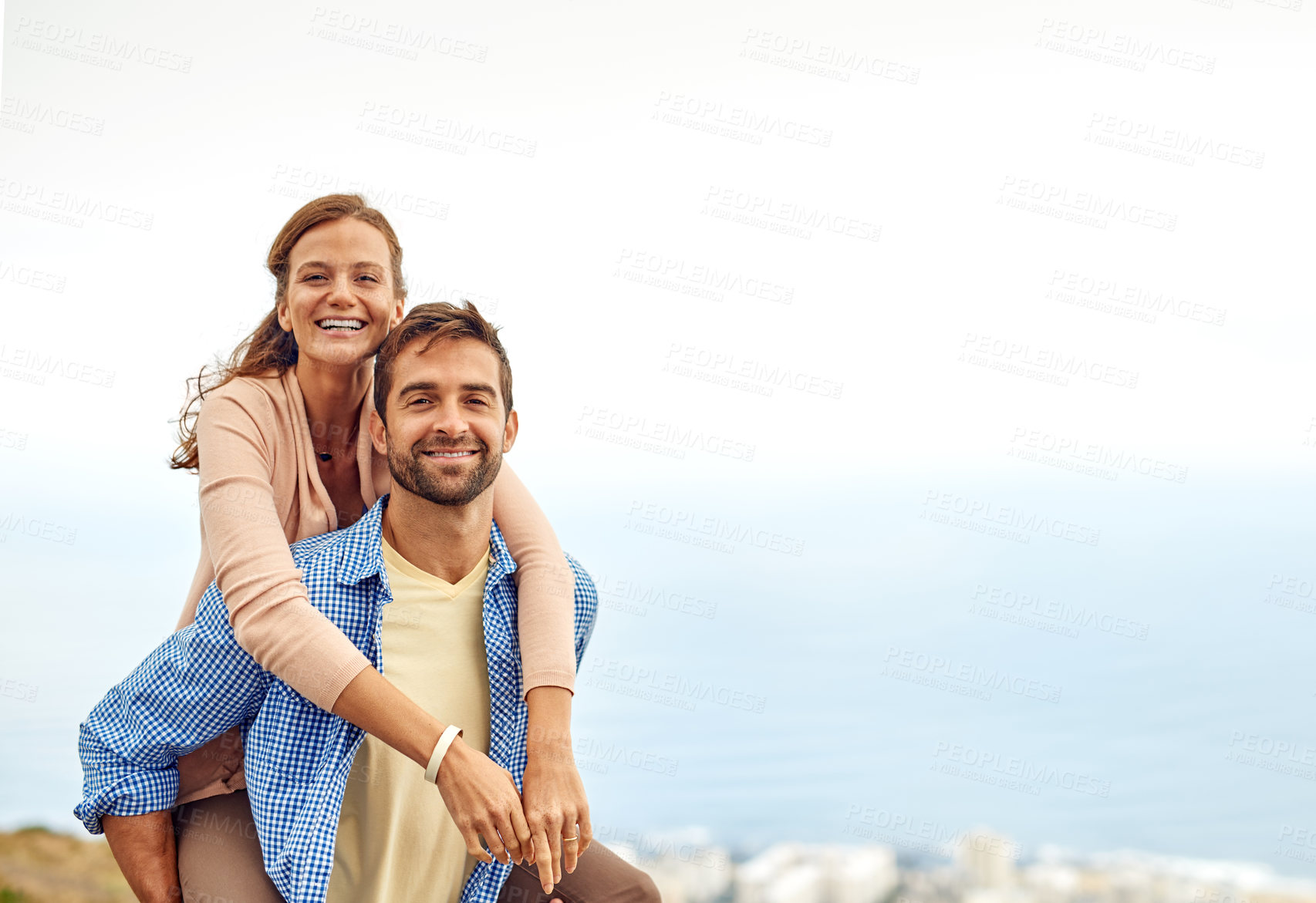 Buy stock photo Couple, piggy back and smile in portrait, outdoors and vacation or holiday, date and bonding for love. Happy people, play and fun on trip, travel and connection in marriage, support and trust or face