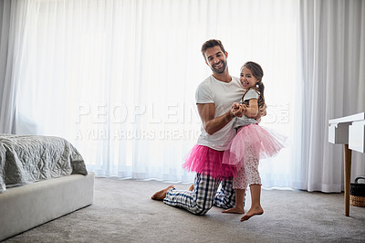 Buy stock photo Full length shot of a handsome young man and his daughter dancing at home