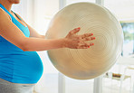 She's on the ball with her pregnancy workout routine