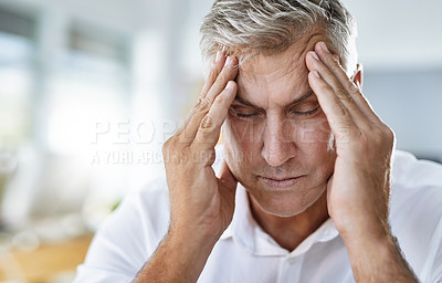 Buy stock photo Headache, stress and mature businessman in the office with healthcare problem or medical emergency. Medical issue, burnout and sick professional corporate manager in pain with a migraine in workplace