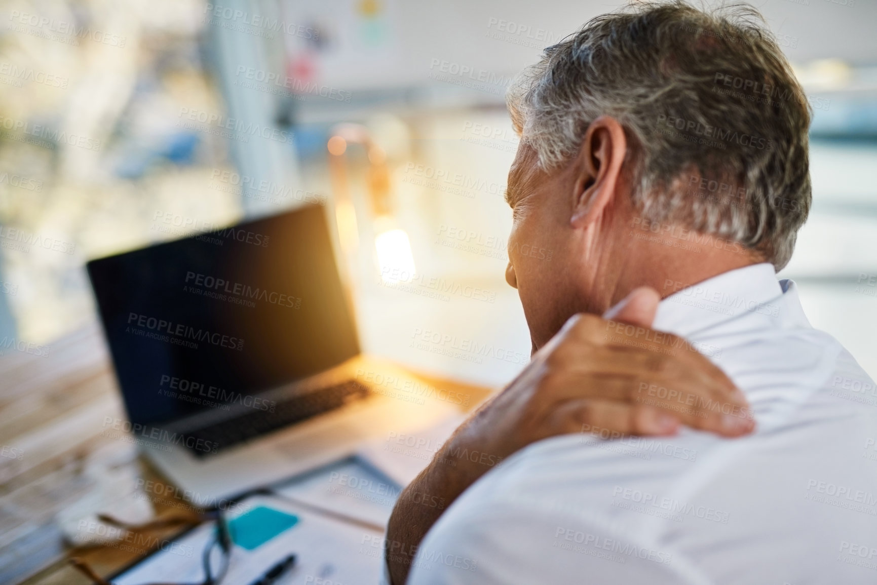 Buy stock photo Man, business and workplace with shoulder pain or injury for health, hand for burnout stress or crisis. Male manager, medical problem and spine condition, accountant with neck fatigue in office