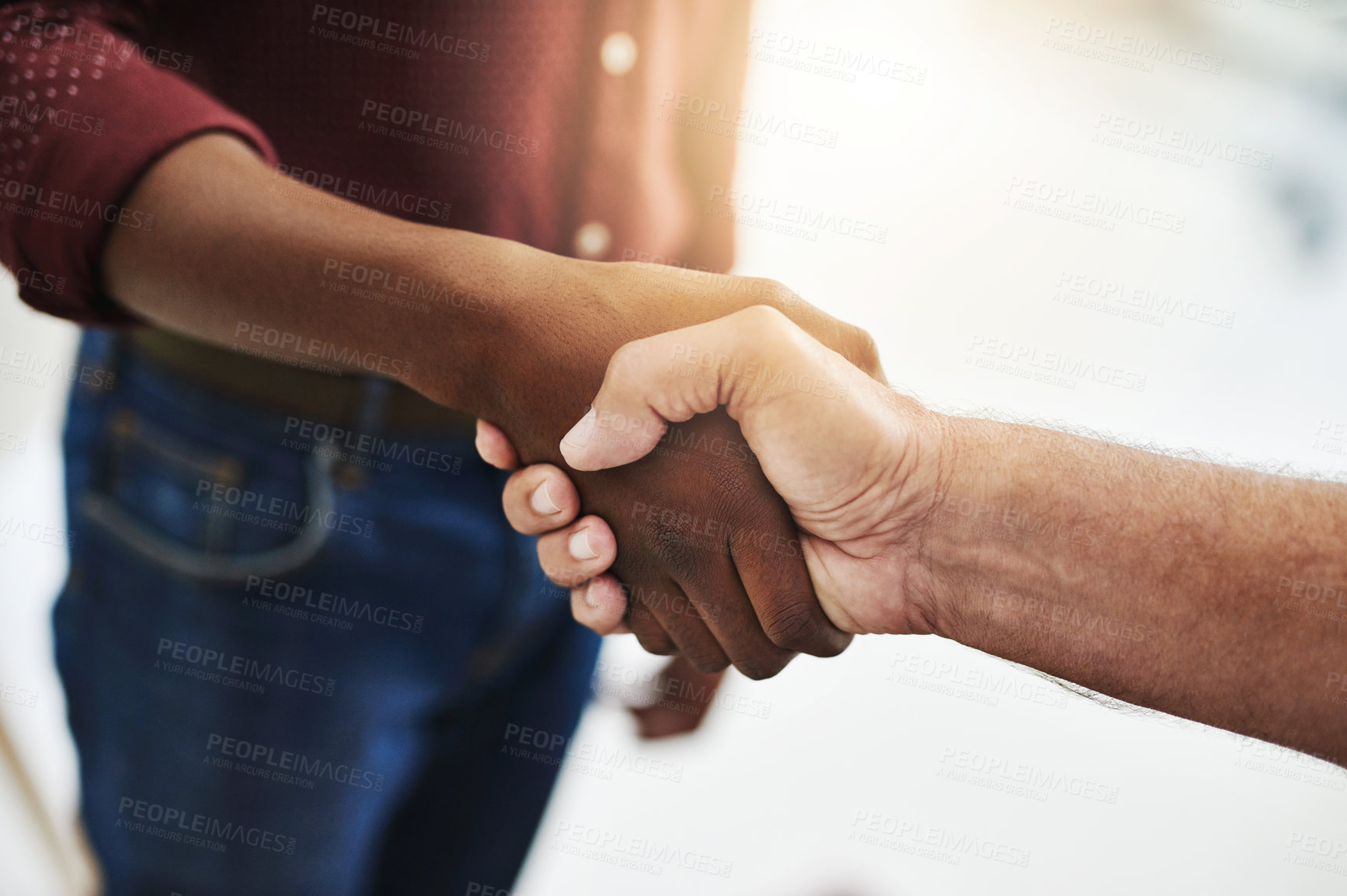 Buy stock photo Handshake of two business men and success in an interview. Closeup of diverse males making deal or agreement for a business plan or startup. United partners collaborating to achieve a goal together 