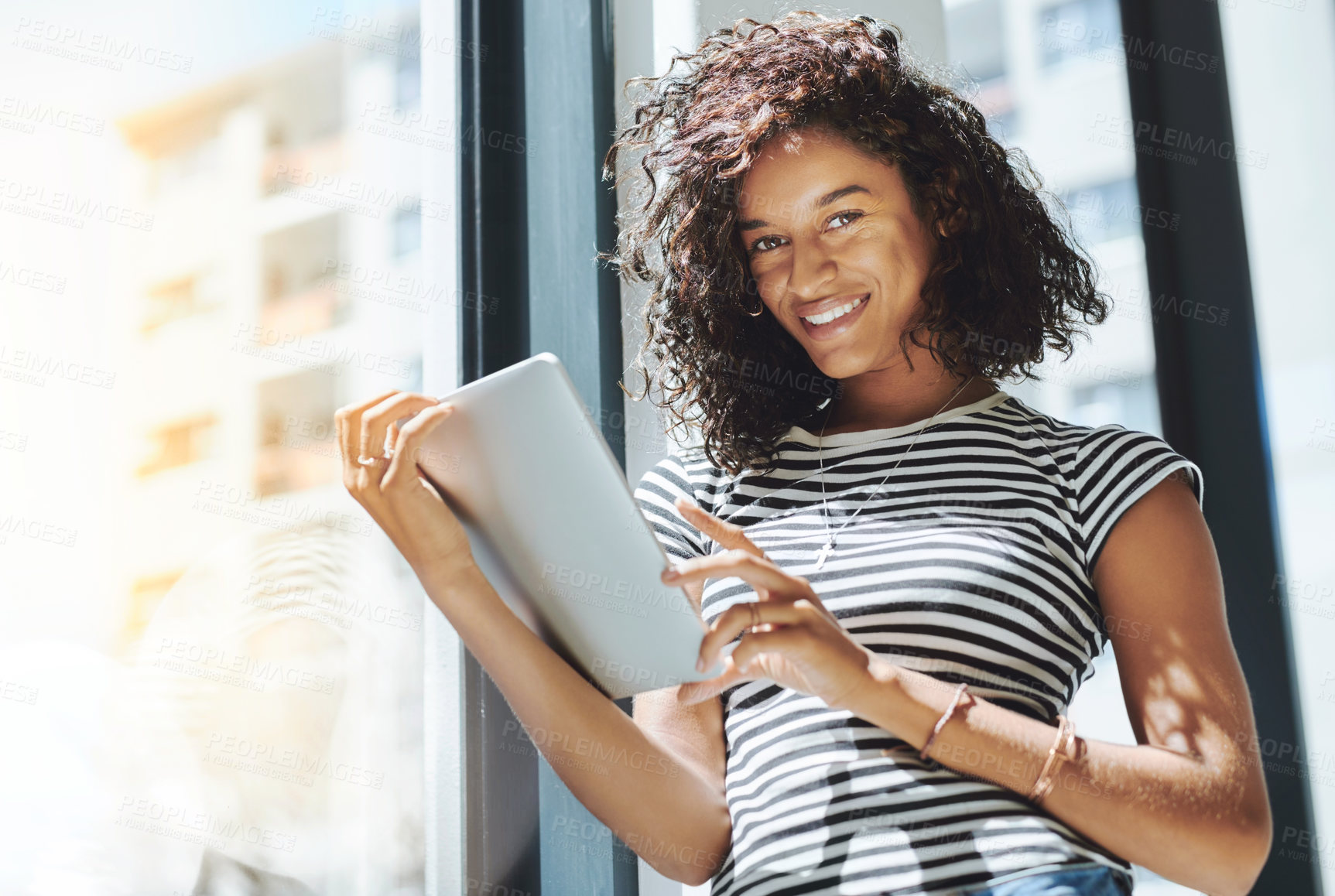 Buy stock photo Cropped shot of an attractive young businesswoman in her office