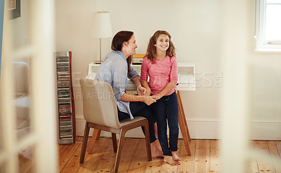 Buy stock photo Shot of a happy young mother and daughter enjoying their time together