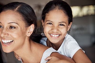 Buy stock photo Portrait of a little girl having fun with her mother at home