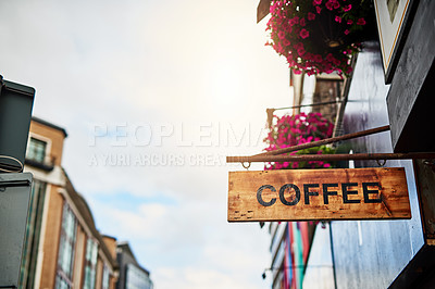 Buy stock photo Coffee shop, city and wood sign for advertising, information or marketing store outdoor. Cafe, banner and board on restaurant building for design, commercial news and rusty public notice for retail