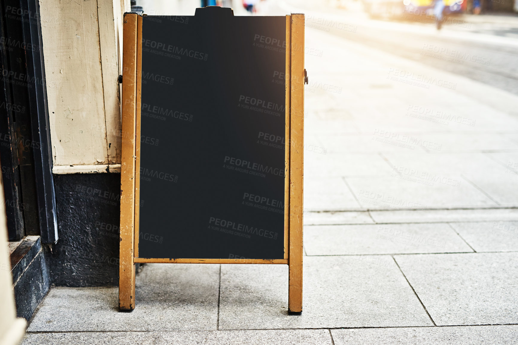 Buy stock photo Shot of a sidewalk sign with space for you to add your own text