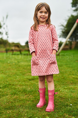 Buy stock photo Portrait of an adorable little girl having fun outdoors