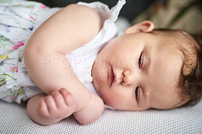 Buy stock photo Cute, sleeping and baby on bed in home for comfortable, development and resting in nursery on weekend. Adorable, sweet and little infant laying in morning for childhood, peace and growth in house