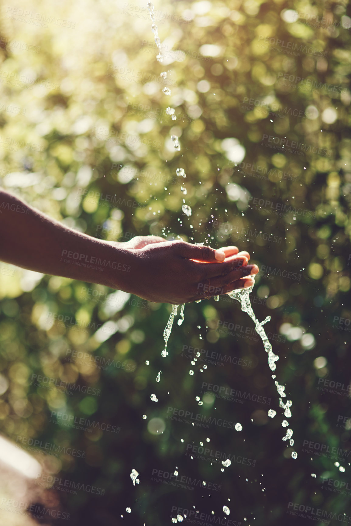 Buy stock photo Water, splash and hydration with a person washing hands outdoor in nature for life, sustainability or moisture. Environment, stream and wet with an adult cleaning outside for wellness or hygiene