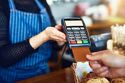 Buy stock photo Credit card payment, cafe and hands with a machine at a restaurant for a service or food. Bakery, pay and a customer paying or buying a product at a coffee shop with a transaction from a worker