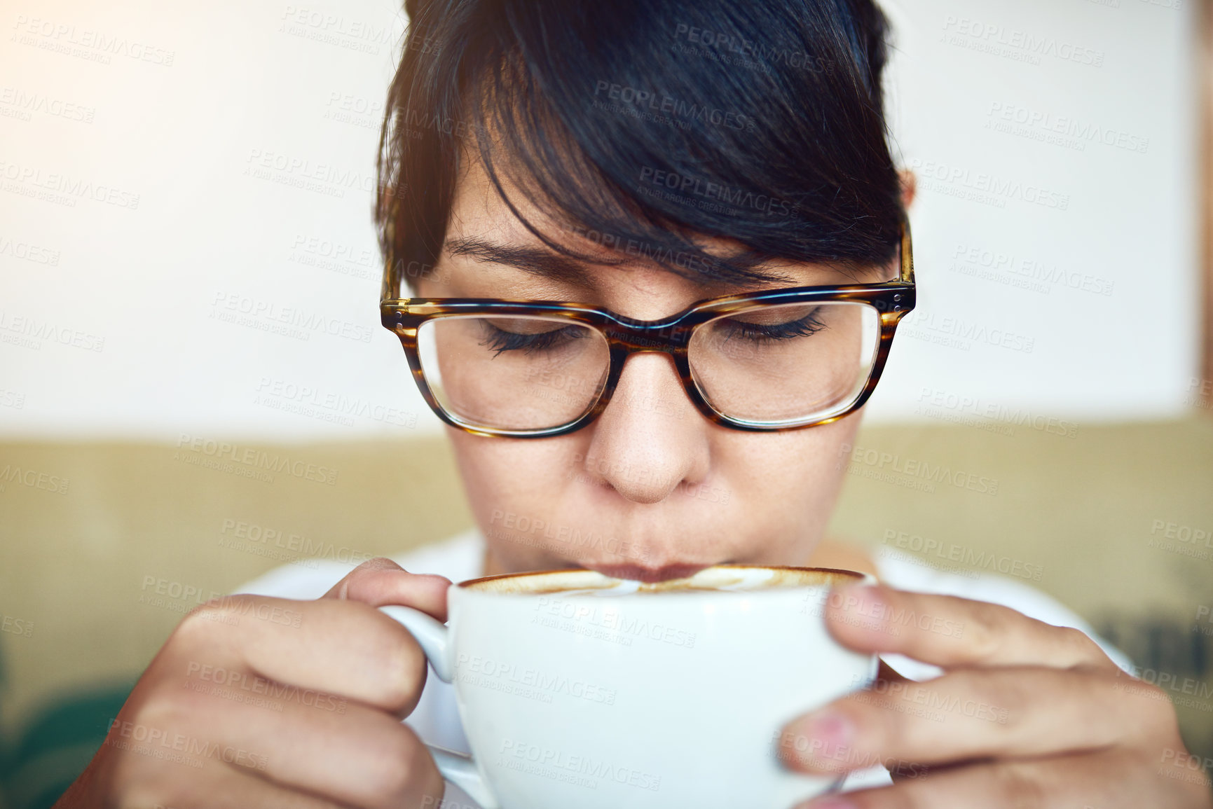 Buy stock photo Closeup, relax and woman in cafe drinking coffee with beverage for peace, wellness or break in restaurant. Customer, glasses and face of person with tea cup for energy in espresso shop for breakfast