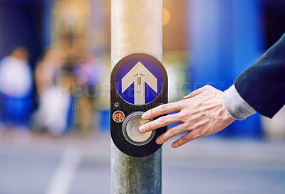 Buy stock photo Button, crosswalk and hand of pedestrian on street of city for commute, direction or travel. Arrow, press or push and business person outdoor in urban town for crossing road safely with traffic