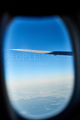 Buy stock photo Cropped shot of the views from an airplane window