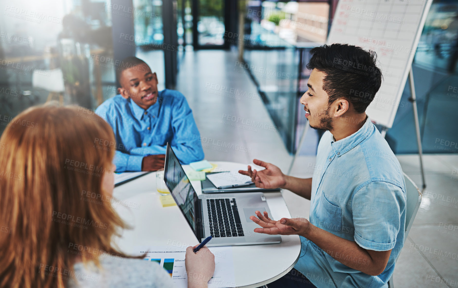 Buy stock photo Laptop, business and people with meeting for strategy, planning and brainstorming. Employees, paperwork and office as research analyst for project with teamwork, discussion and collaboration