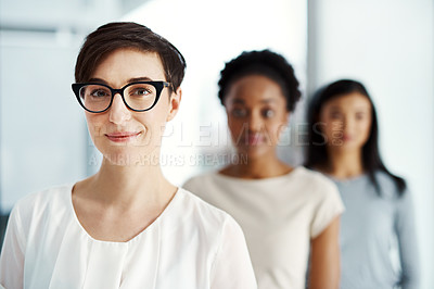 Buy stock photo Portrait of a young woman leading a movement, empowering women while standing in a line together. Voters with a vision or goal, ready to share their opinion. Females uniting in support together