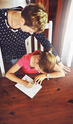 Buy stock photo Mother, child and top view of writing in home school for education, studying or list of chores. Above, mom and help kid learning, homework and teaching student on notebook for development of family