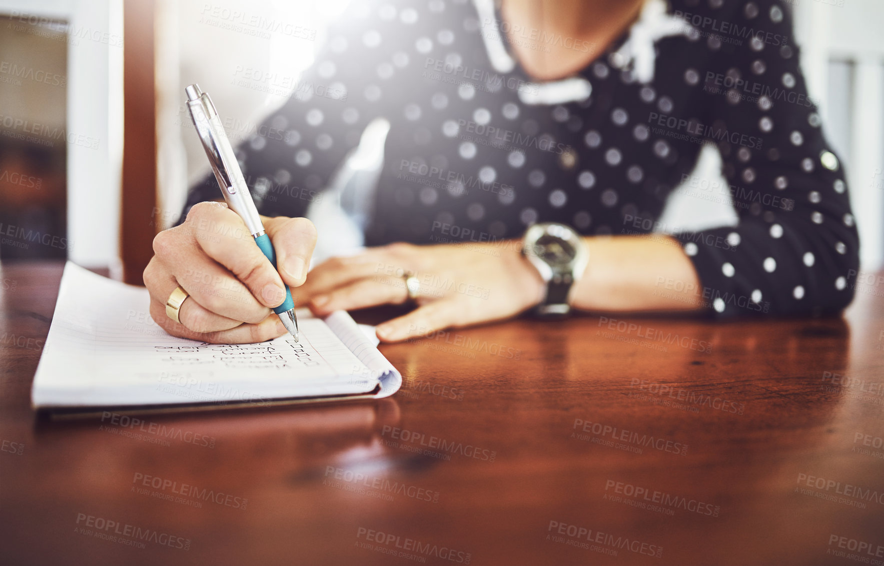 Buy stock photo Woman, writing and home table with notebook and day schedule in a dinning room. Lens flare, female person and to do list in a house with notepad, page and book for planning to write a article