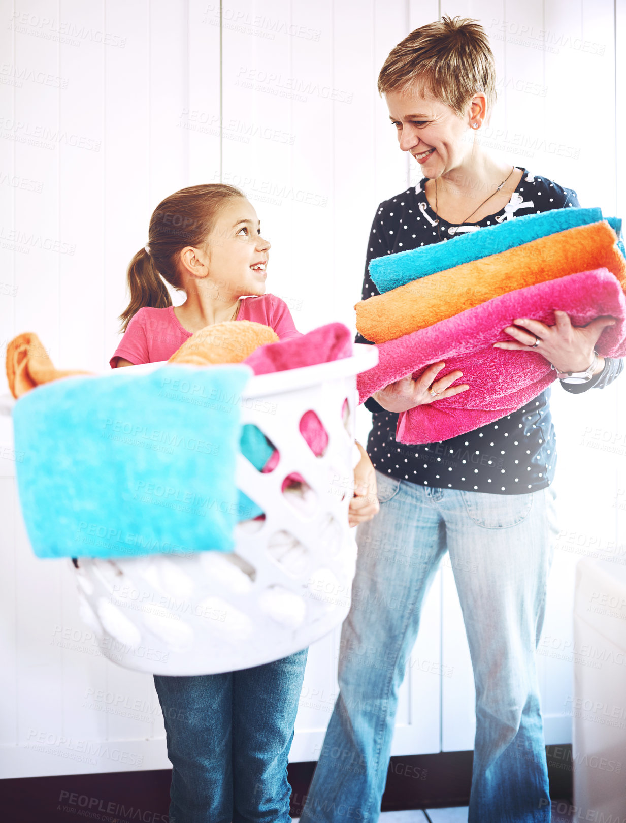 Buy stock photo Laundry, child and woman with clean towel after washing material, cotton and housework in the morning. Chores, housekeeping and girl or female person with basket, fabric or soft cloth as routine