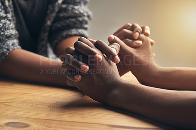 Buy stock photo Love, partnership and couple holding hands for support, unity and sympathy by wood table. Empathy, care and couple or friends with affection in an intimate bonding moment together for grief and loss.