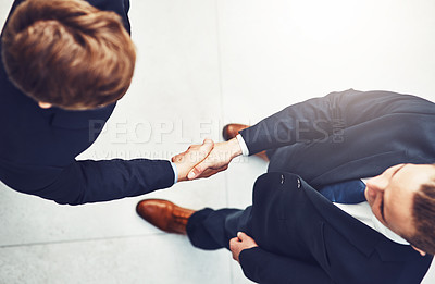 Buy stock photo Corporate, handshake and business men in meeting for partnership, b2b agreement or deal with lens flare. Above view, professional and people shaking hands for greeting, introduction or welcome