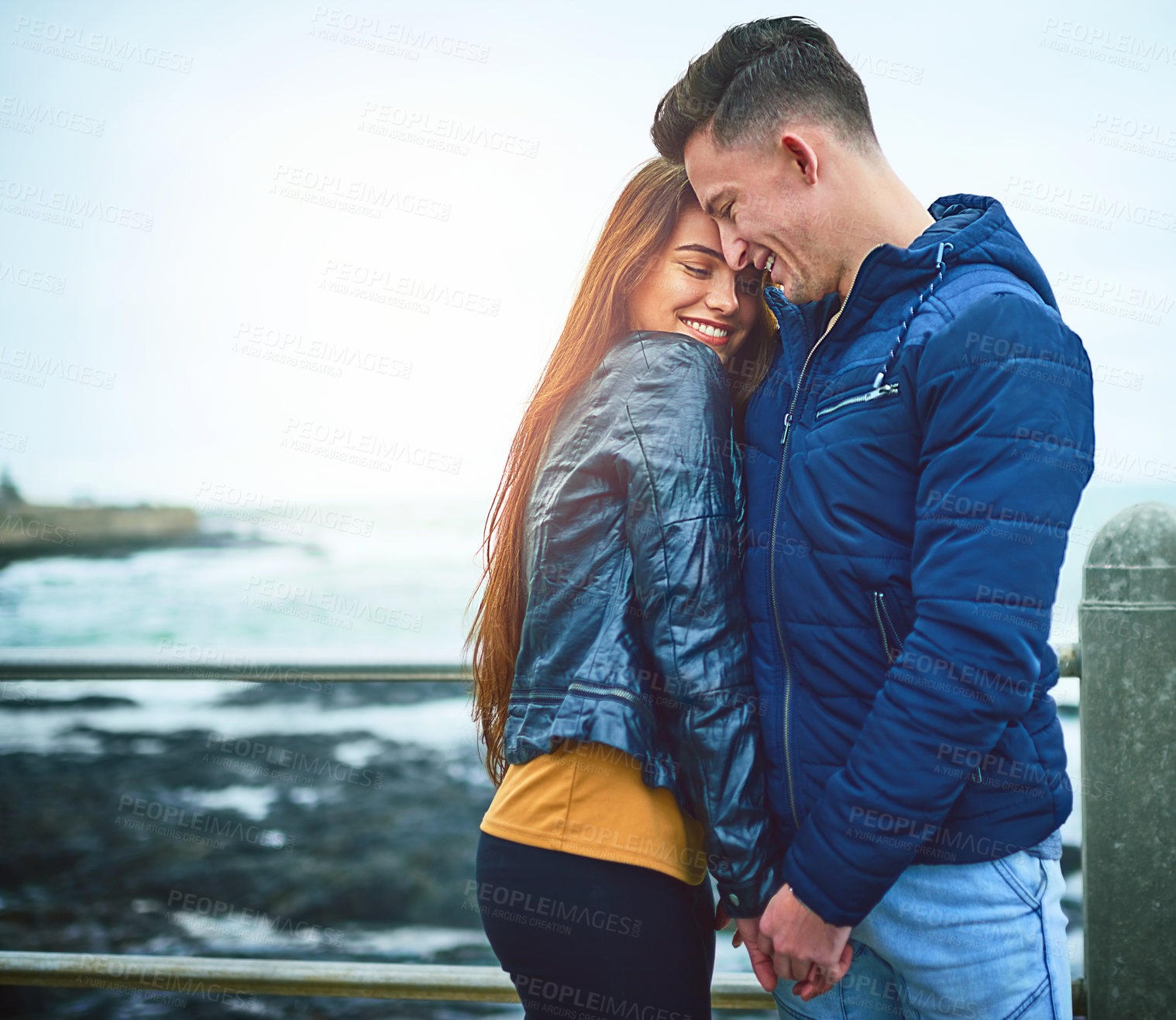 Buy stock photo Couple, hug and beach for love, date and relax with relationship, romance and outdoor bonding. Man, woman and happy by ocean for care, support and connection with partner, smile and weekend together