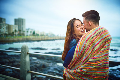 Buy stock photo Shot of a happy young couple spending a romantic day together outdoors