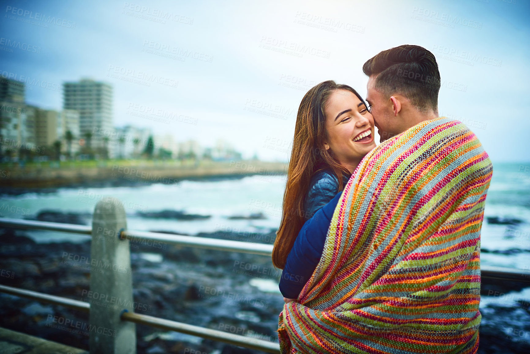 Buy stock photo Shot of a happy young couple spending a romantic day together outdoors