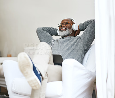 Buy stock photo Senior black man, relax and listening to music, podcast or jazz on radio in living room. Headphones, retirement and happy person streaming audio, sound or vintage playlist on tablet in home on sofa