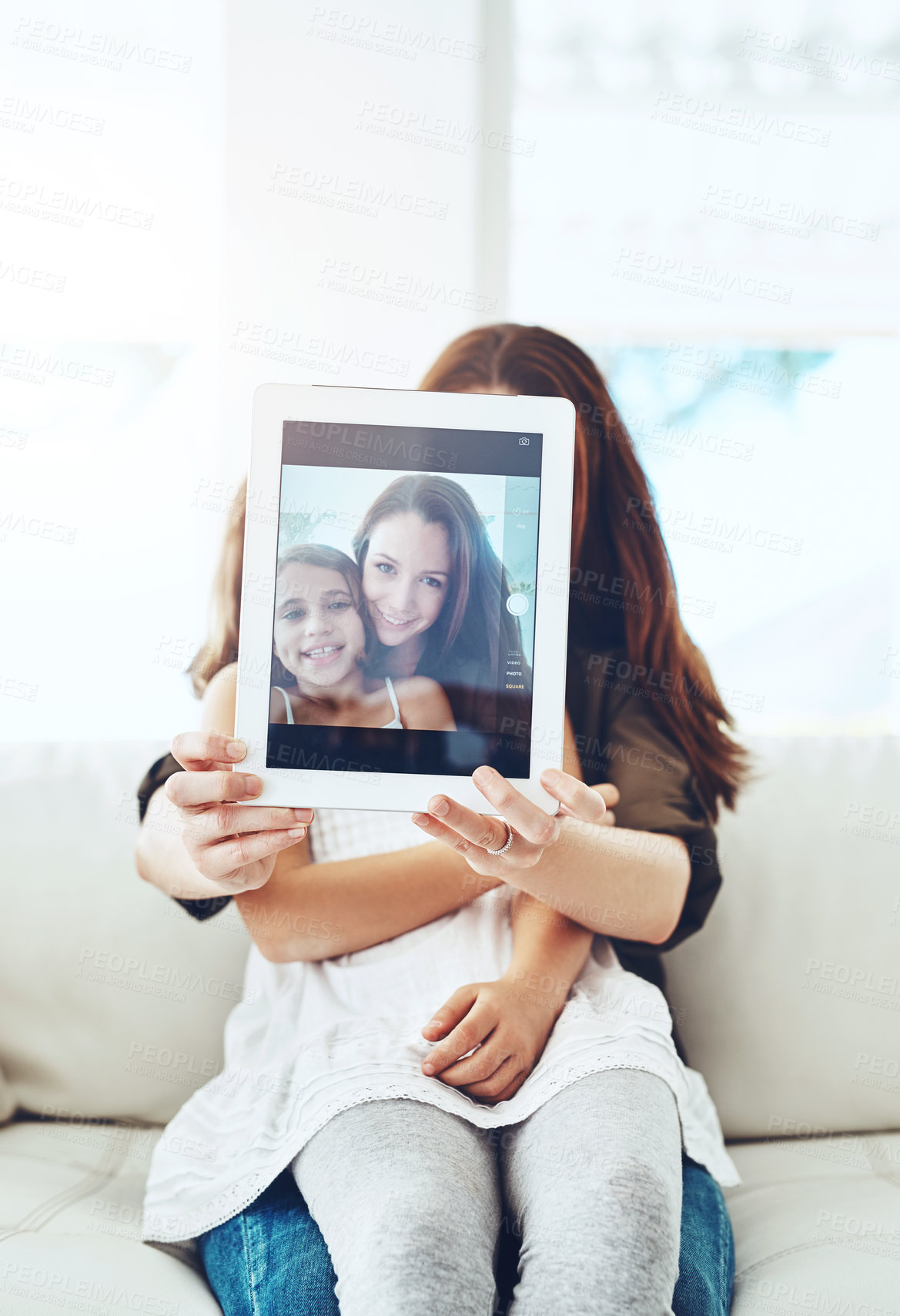 Buy stock photo Tablet, screen and selfie of mommy and girl, profile picture and network for social media update. Happy mother, daughter and capture memory or in lounge for bonding, camera app and relax on couch