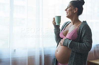 Buy stock photo Home, tea and pregnant woman with stomach for touching, feeling or growth for baby development. Beverage, female person or lingerie with laugh for motherhood, pregnancy or connect with fetus by space