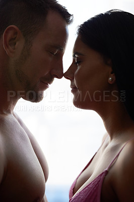 Buy stock photo Happy couple, eskimo kiss and bonding in bedroom with love for rest, relax and break on weekend. Woman, man and romance, together and relationship for comfort, nose touch and affection in home