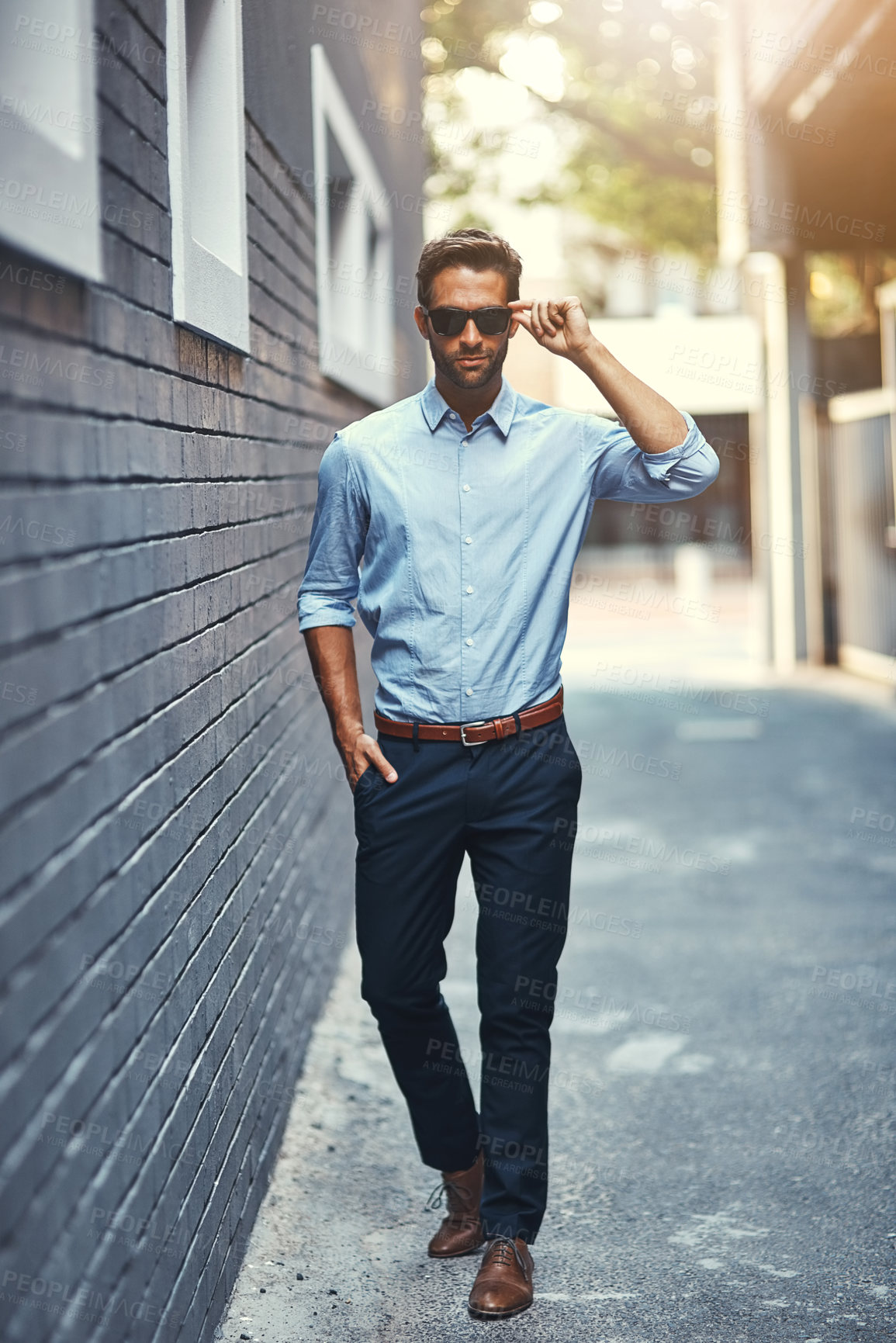 Buy stock photo Stylish, businessman and confident in street as property agent for fashion, edgy and trendy in outdoor. Male person, pride and real estate for work, corporate or career in men's wear in New York City