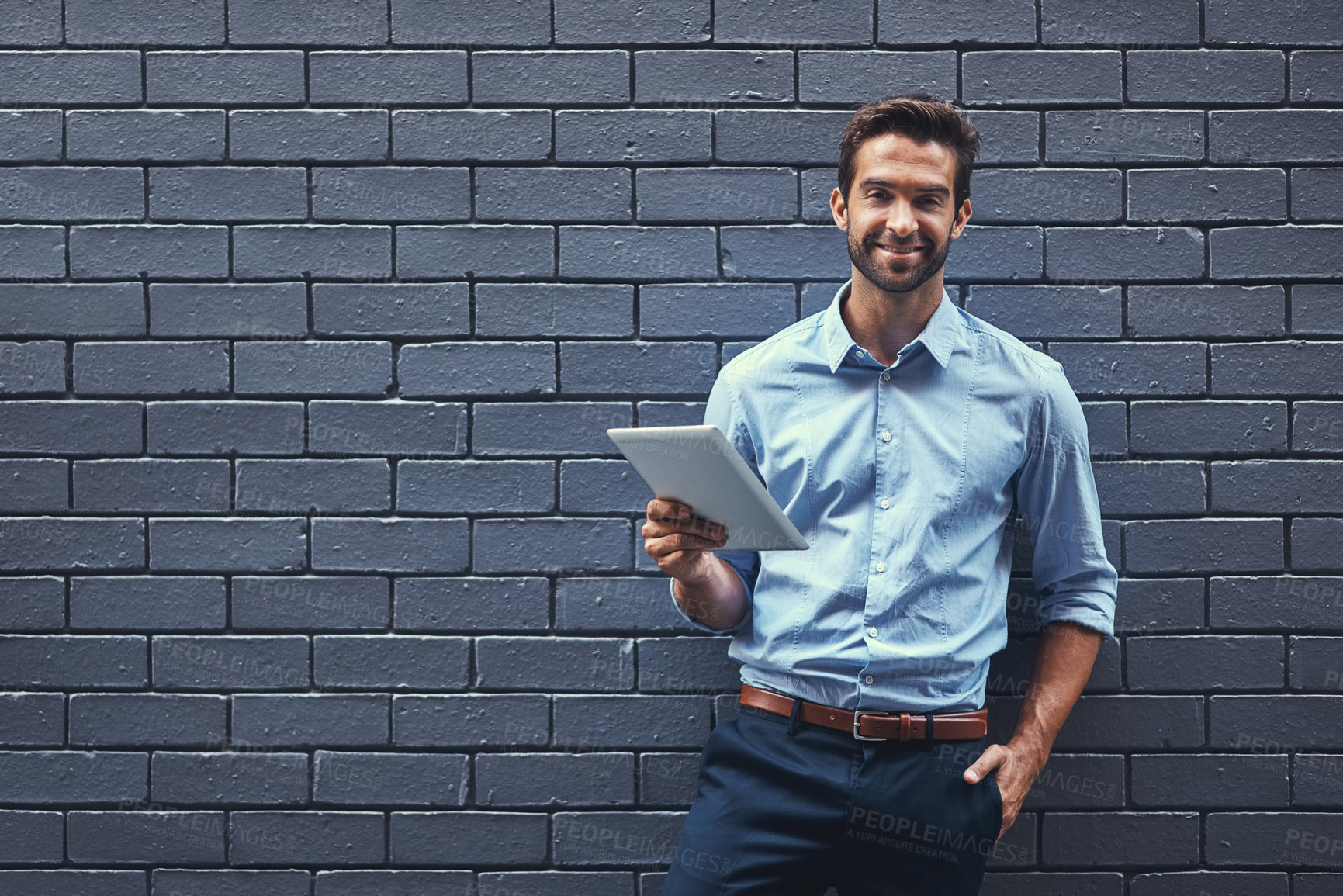 Buy stock photo Portrait, tablet and smile of business man on a wall background mockup space in city. Happy, digital tech and professional entrepreneur, employee and confident salesman working on internet in Canada