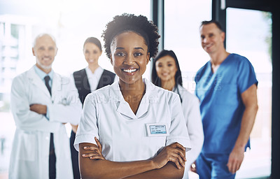 Buy stock photo Leadership, teamwork and portrait black woman with doctors, nurses and smile in hospital. Healthcare, diversity and medicine, doctor with arms crossed and team of medical employees together in clinic