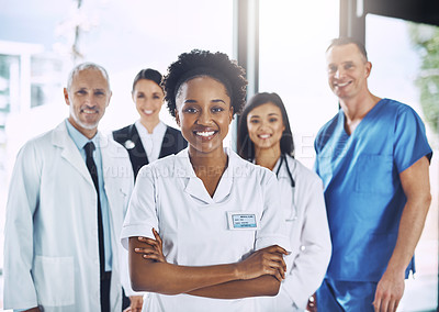 Buy stock photo Smile, team and portrait of black woman with doctors, nurses and diversity in hospital with teamwork in healthcare. Health, support and boss, confident doctor with group of medical employees together
