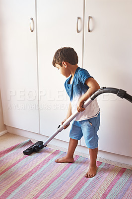 Buy stock photo Vaccuming carpet, clean and a child in room for chores, learning and housework with a vacuum. Housework, house and a boy kid cleaning a mat for responsibility, routine and with machine in a bedroom