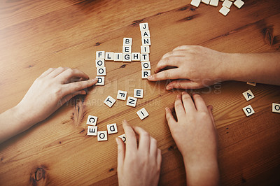 Buy stock photo Shot of a group of people playing a word game together