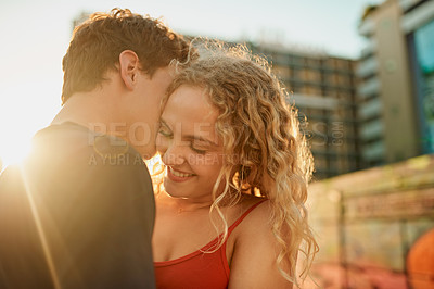 Buy stock photo Happy couple, hug and kiss with love in city for embrace, romance or affection together. Young man, woman or lovers with smile or compassion for initmacy, support or relationship in an urban town