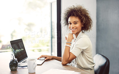 Buy stock photo Cropped portrait of an attractive young businesswoman working on her laptop at home
